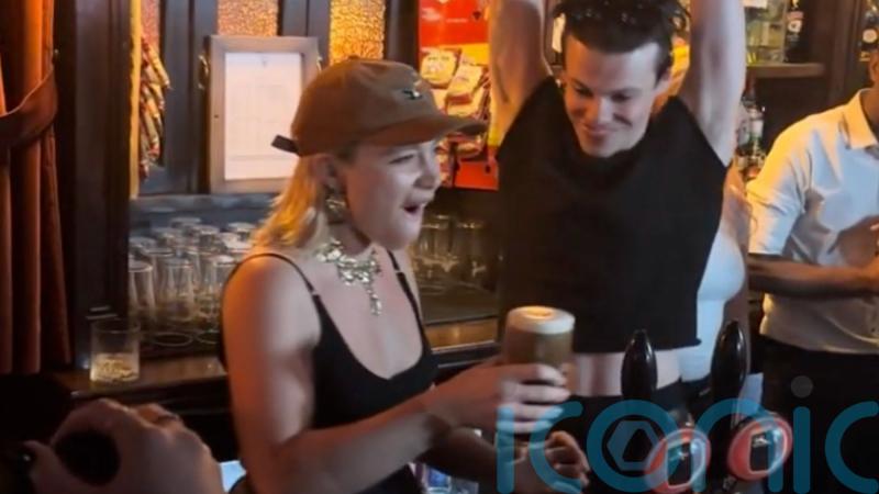 Actor Florence Pugh pours pints at London pub with singer Yungblud