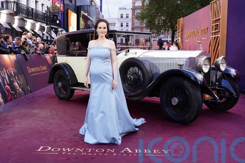 Michelle Dockery reveals she is pregnant with first child at Downton premiere