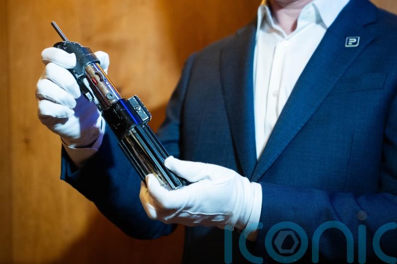 Darth Vader lightsaber prop sells for £2.7m at auction