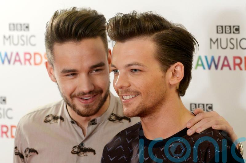 Louis Tomlinson says bandmate Niall Horan told him of Liam Payne’s death