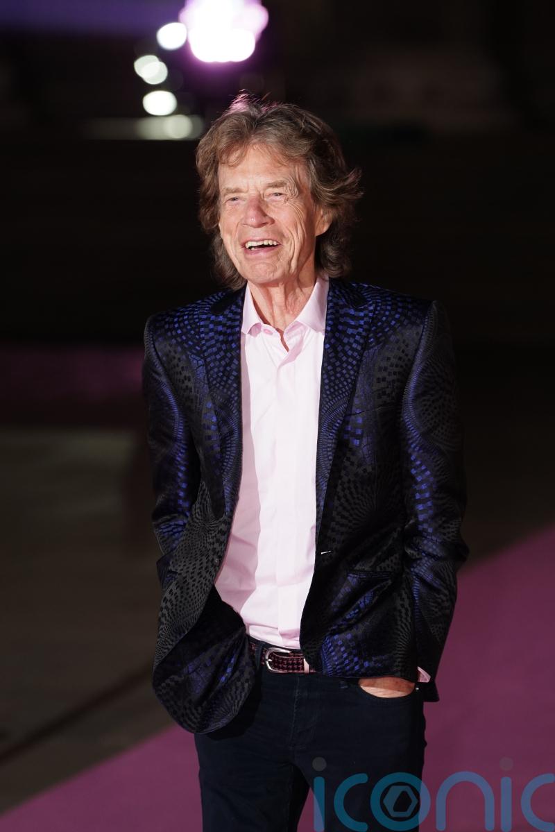 Sir Mick Jagger makes surprise visit to his old school