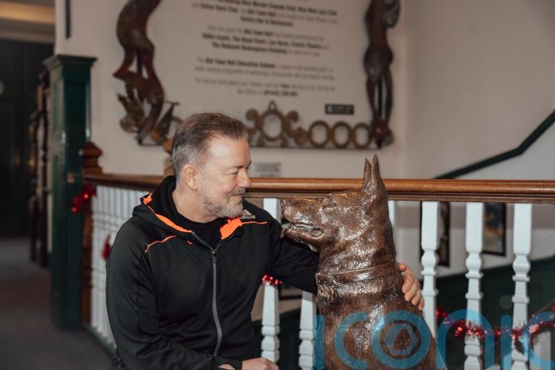Comedian Ricky Gervais unveils statue paying tribute to dog from After Life