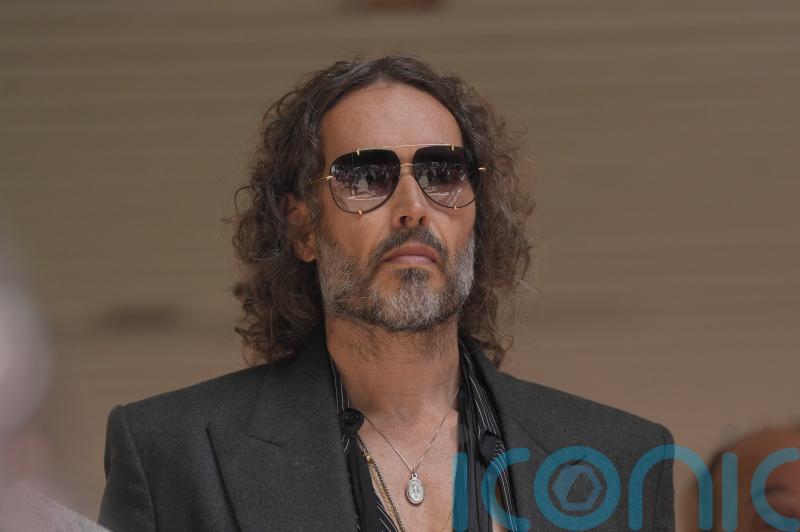 Russell Brand appears in court charged with further sex offences