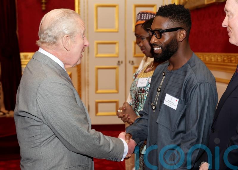 Tinie Tempah asks King for duchy invite at royal event for Nigerian community