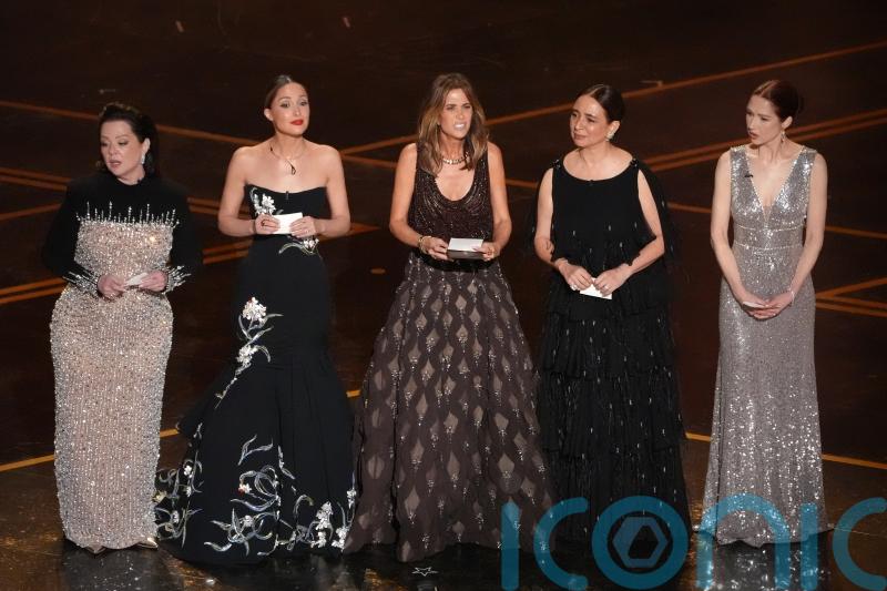 Bridesmaids cast reunite on Oscars stage and read out fake audience notes