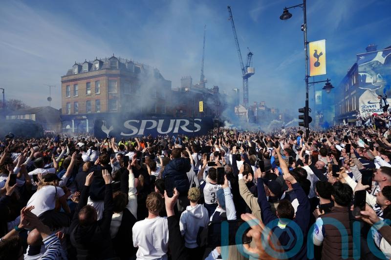 Tottenham fans flood streets to welcome team bus ahead of crunch Forest clash